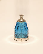 2601 blue faceted K9 crystal night lamp on a warm ivory background