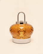 2555 amber faceted K9 crystal night lamp on a warm ivory background