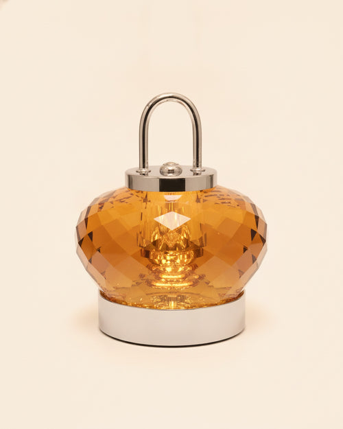 2555 amber faceted K9 crystal night lamp on a warm ivory background