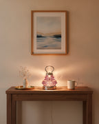 Purple crystal night lamp styled on a walnut entry console with a tray and vase