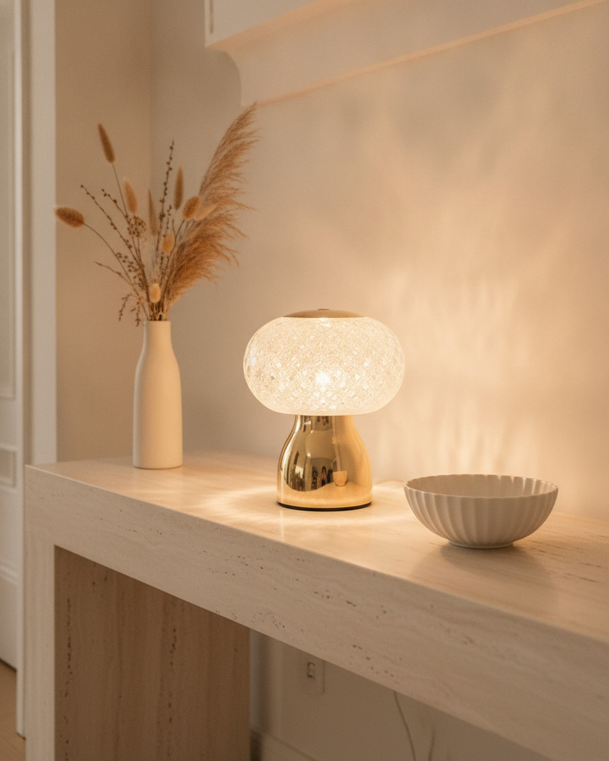 Brilliance faceted crystal accent lamp styled on a travertine entry console