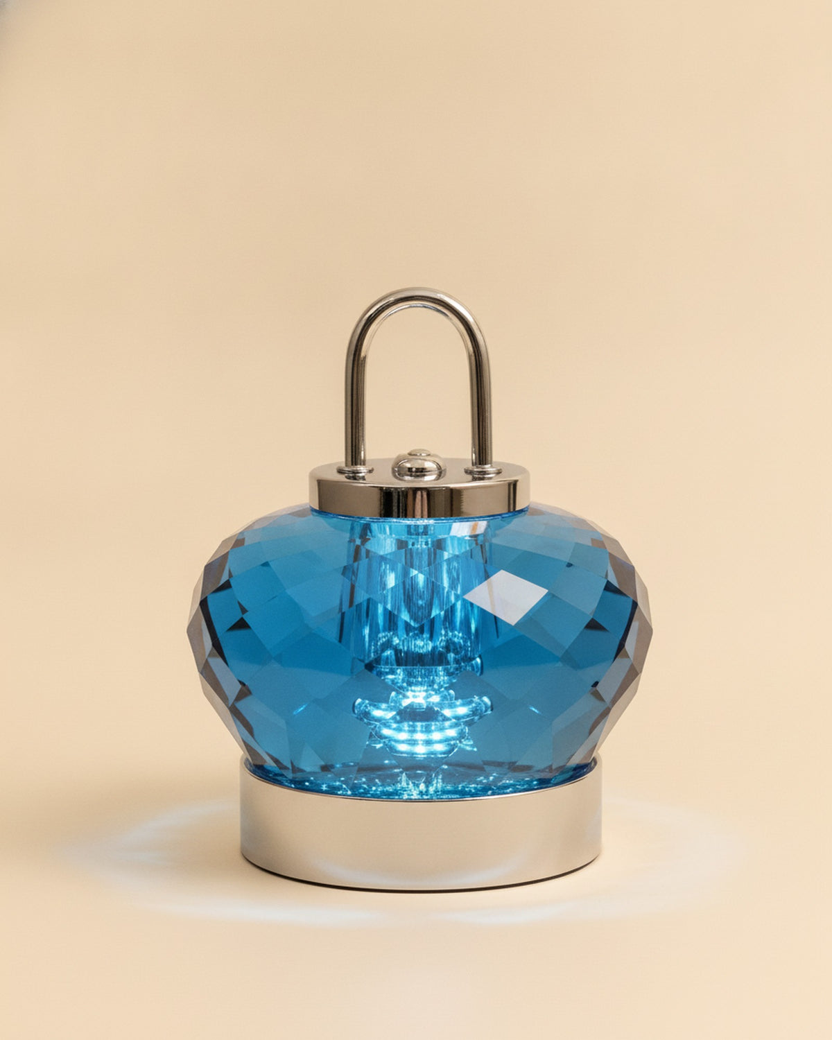 2555 Sky Blue Faceted Crystal Night Lamp with Handle on warm ivory backdrop