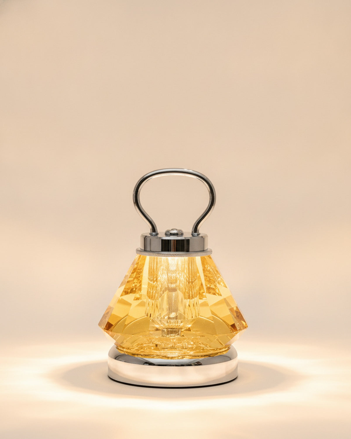 2658-L Champagne Gold Tapered Faceted Crystal Lamp with Handle on warm ivory backdrop