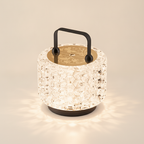 Faceted honeycomb acrylic body and engraved gold-tone top of the Monet Garden lamp