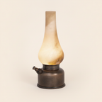 Translucent alabaster shade and antique-bronze aluminium base of the Luminous lamp