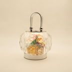 Faceted crystal barrel with iridescent fragments and polished aluminium disc base and handle