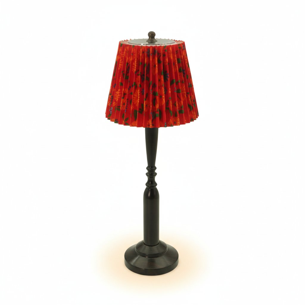 Jovial pleated fabric table lamp, red floral print shade, on warm cream