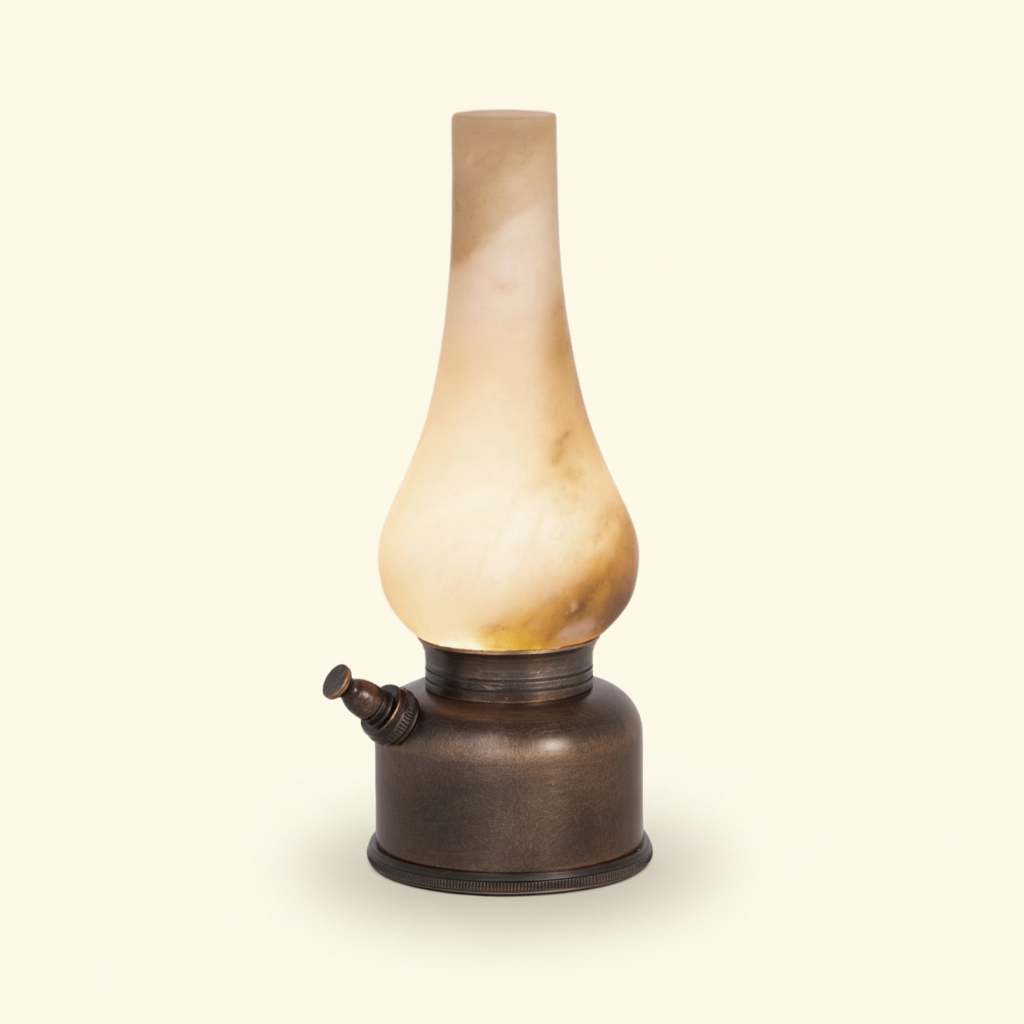 Luminous alabaster accent lamp glowing on a warm cream background