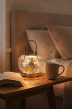 Nivin crystal lantern on a bedside table, portrait lifestyle photograph